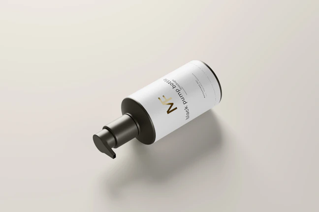 Close-up of a sleek synthetic product bottle with a minimalist label on a wooden surface.