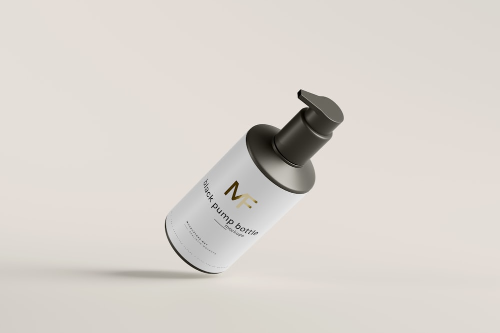 a white bottle with a black cap on a white background