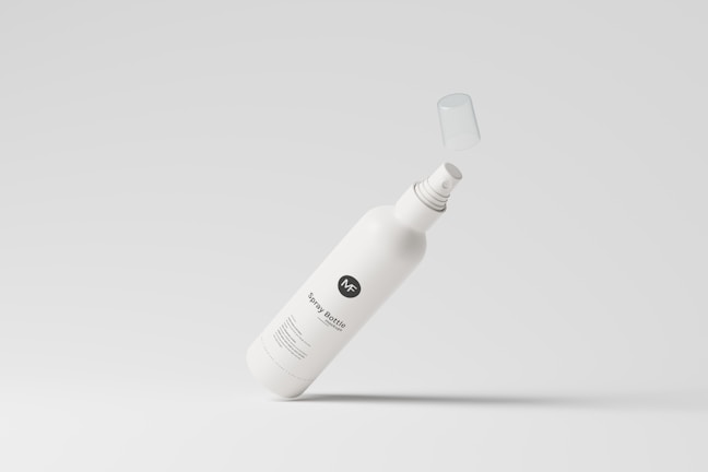 Tonic purity spray misting gently over a minimalist white background.