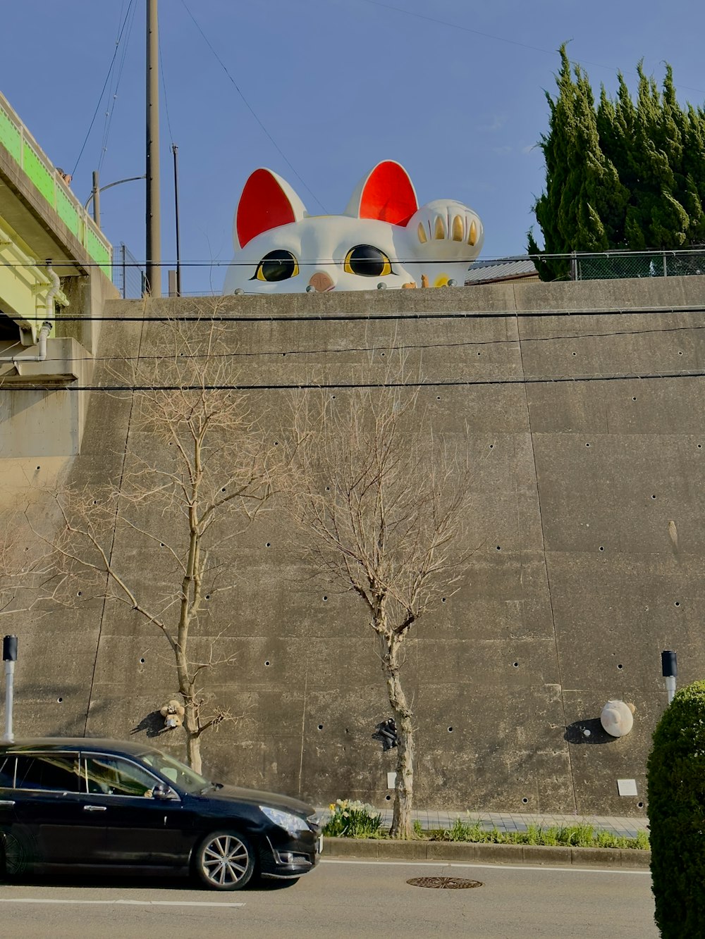 a car is parked in front of a building