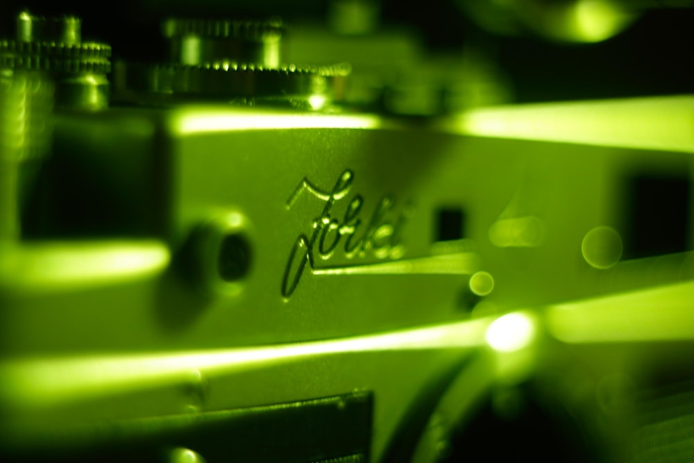 a close up view of a green electronic device