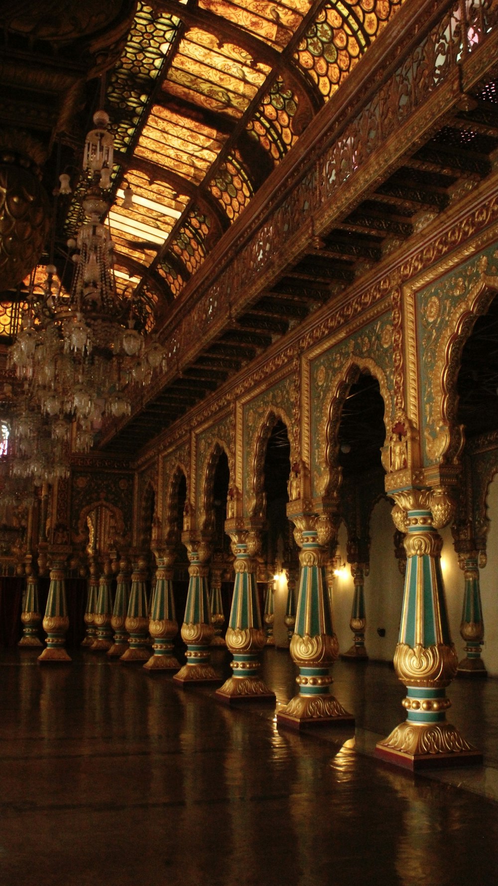 a large room with a chandelier hanging from the ceiling