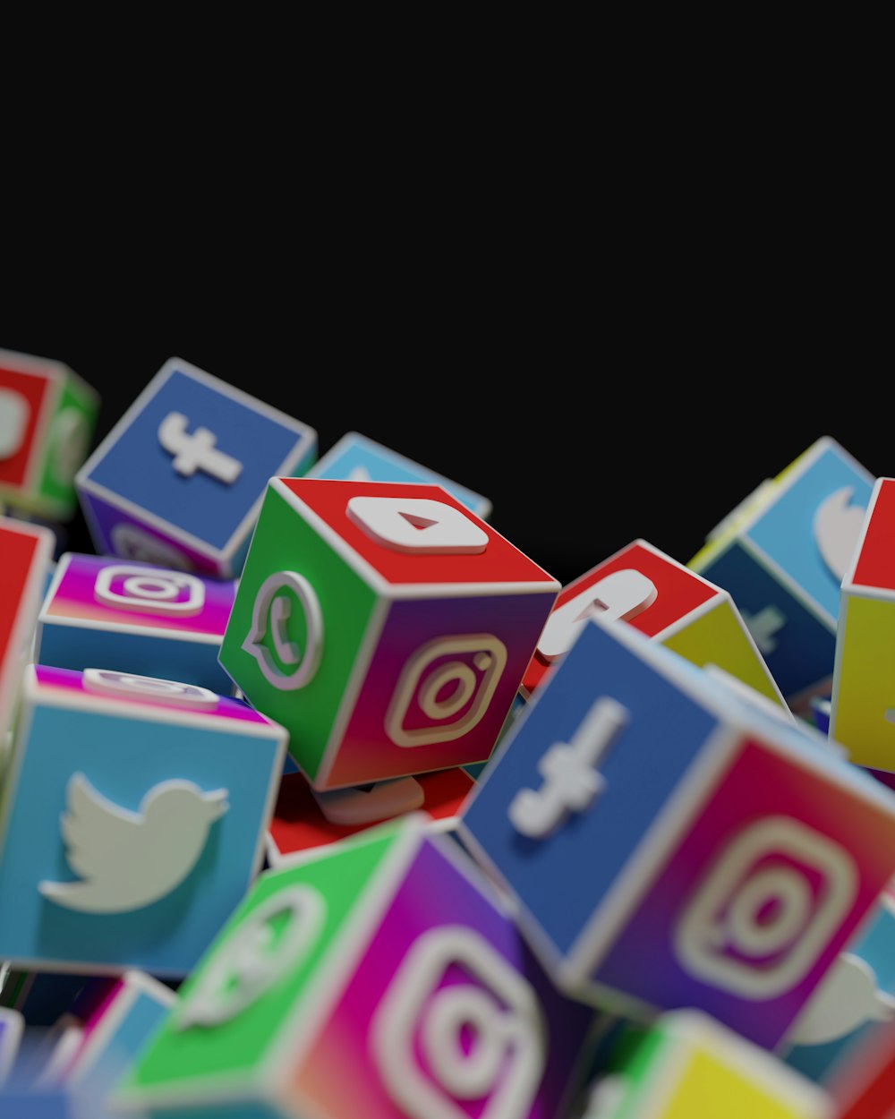 a pile of colorful blocks with social icons on them