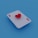 An Ace of Hearts playing card is placed on a blue background, with a three-dimensional red heart symbol hovering above the card.