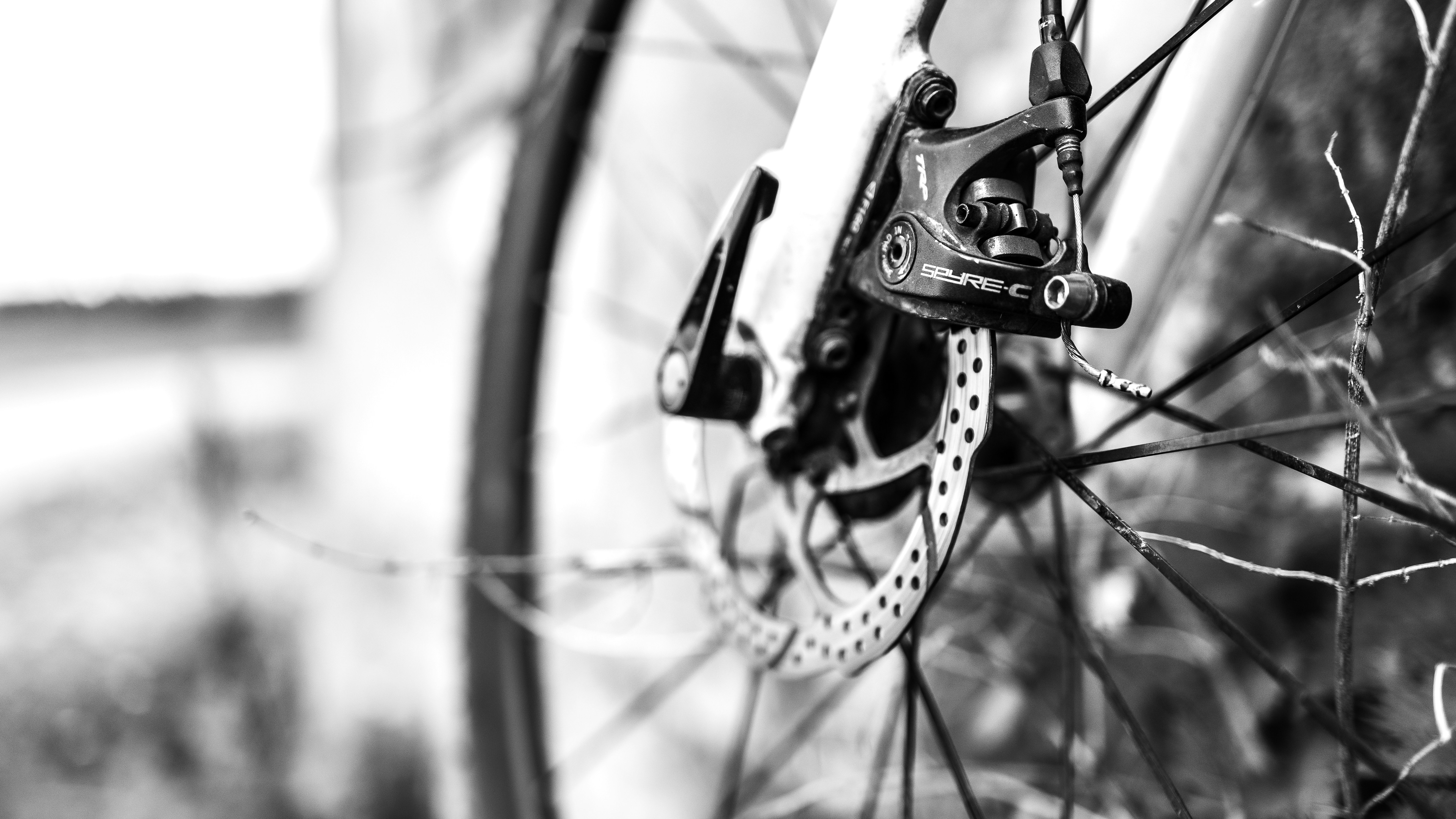 a close up of the spokes of a bicycle
