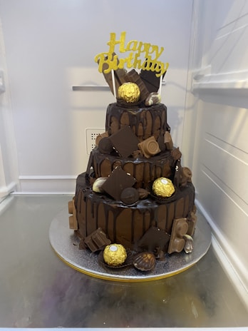 A treasure chest cake roll decorated with edible gold coins and pirate flags.