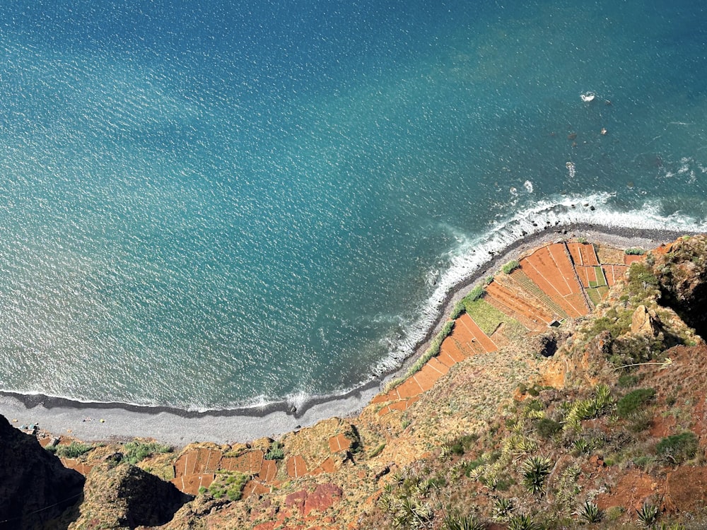 an aerial view of a beach and a body of water