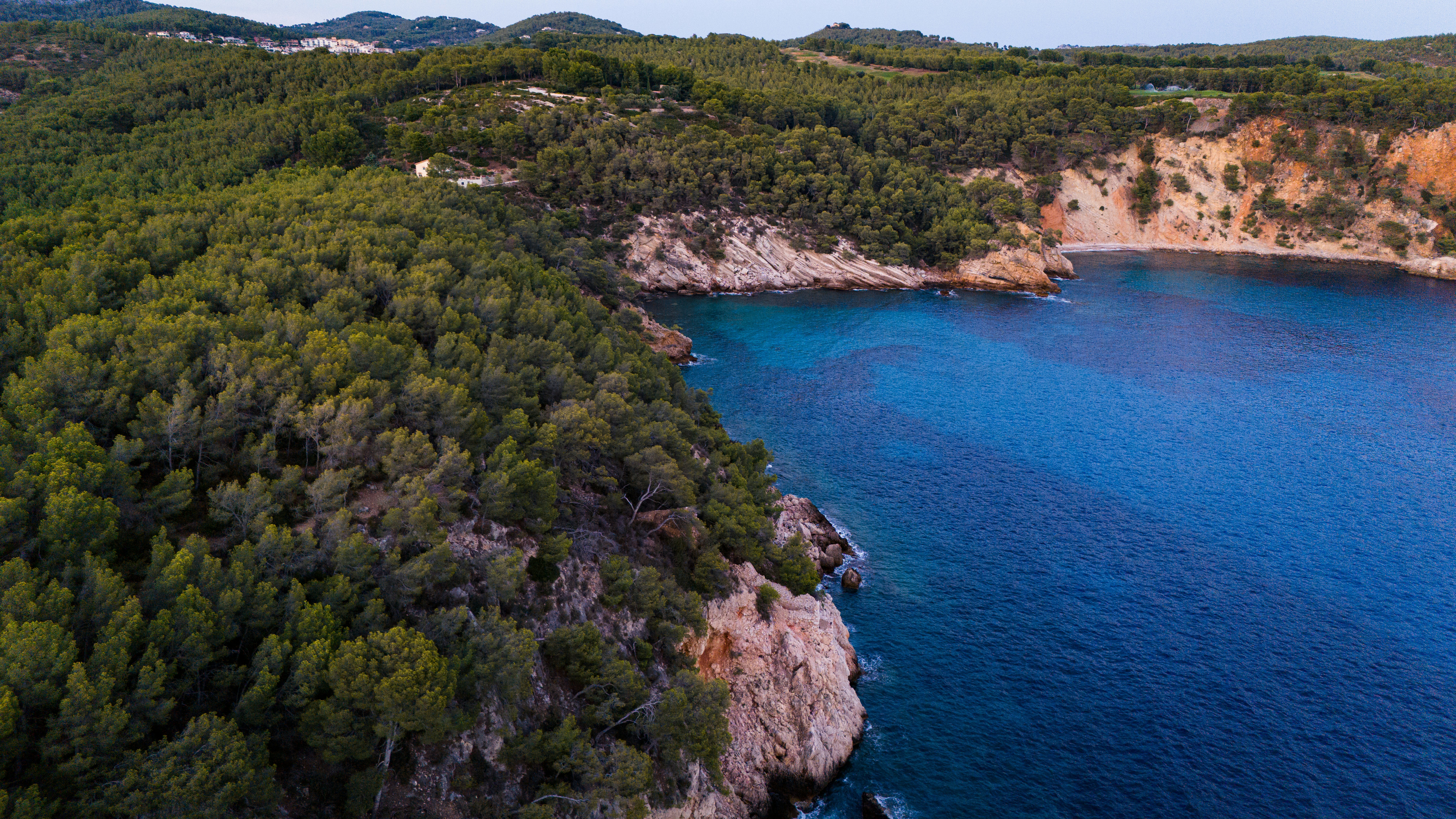 View of Calanques coast with blue sea from a drone
