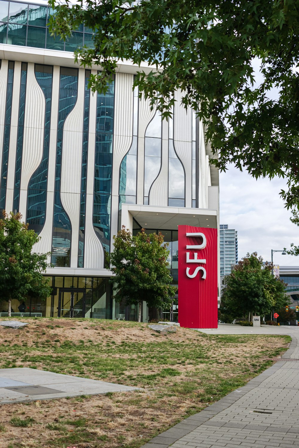 a building with a red sign in front of it