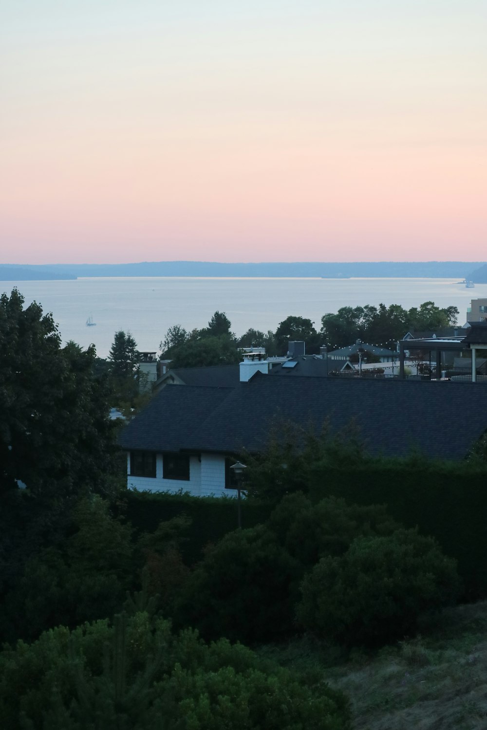 a view of a body of water from a hill