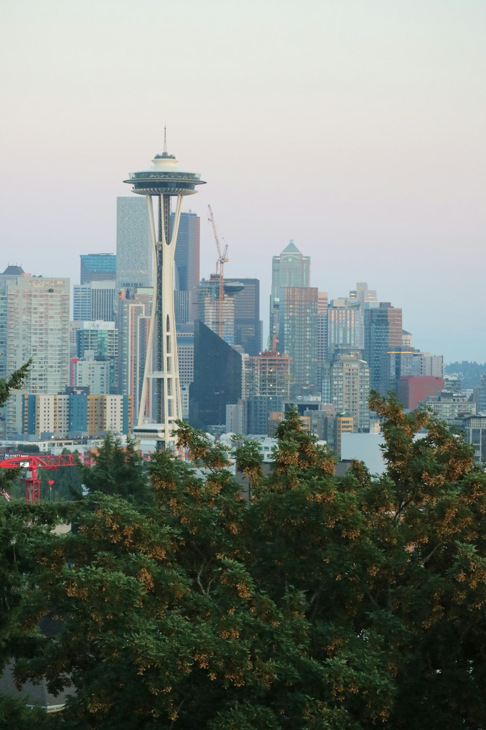 a view of the seattle skyline with the space needle in the foreground