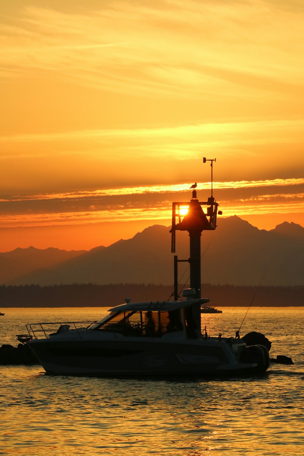 a boat floating on top of a body of water