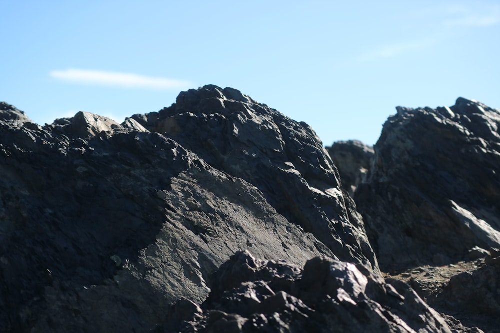 a group of large rocks sitting on top of a mountain