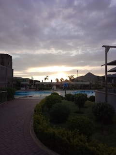 Twilight scene showcasing soft outdoor lighting illuminating a beautifully maintained garden.