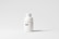 A white plastic bottle with a screw top, labeled 'Medicine Bottle mockup' and the letters 'MF' in bold. The bottle is placed against a plain, light gray background, with some small text details visible on the right side.