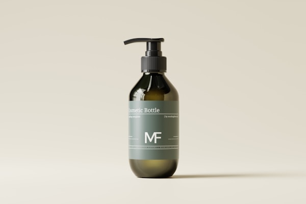A minimalist design of a dark green cosmetic bottle with a pump dispenser, placed against a light beige background. The bottle has a label with white text and a simple logo.