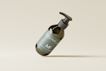 A dark green bottle with a pump dispenser and a minimalist label floats against a neutral background. The label includes text and geometric elements, creating a clean and modern aesthetic.