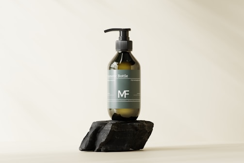 Elegant pump bottle of hydrating serum on white surface with subtle botanical shadows