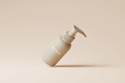 Sleek hydraulic pump displayed on a minimalist white surface with subtle green lighting.