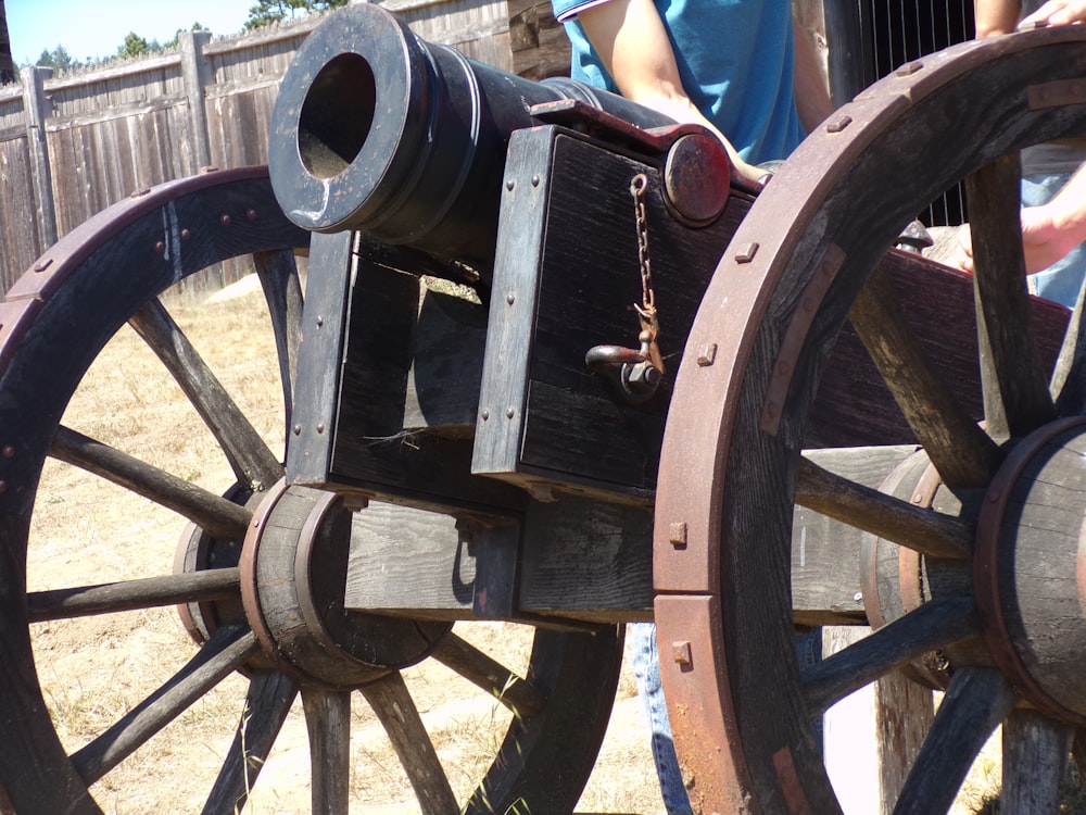 a close up of an old fashioned wooden cart