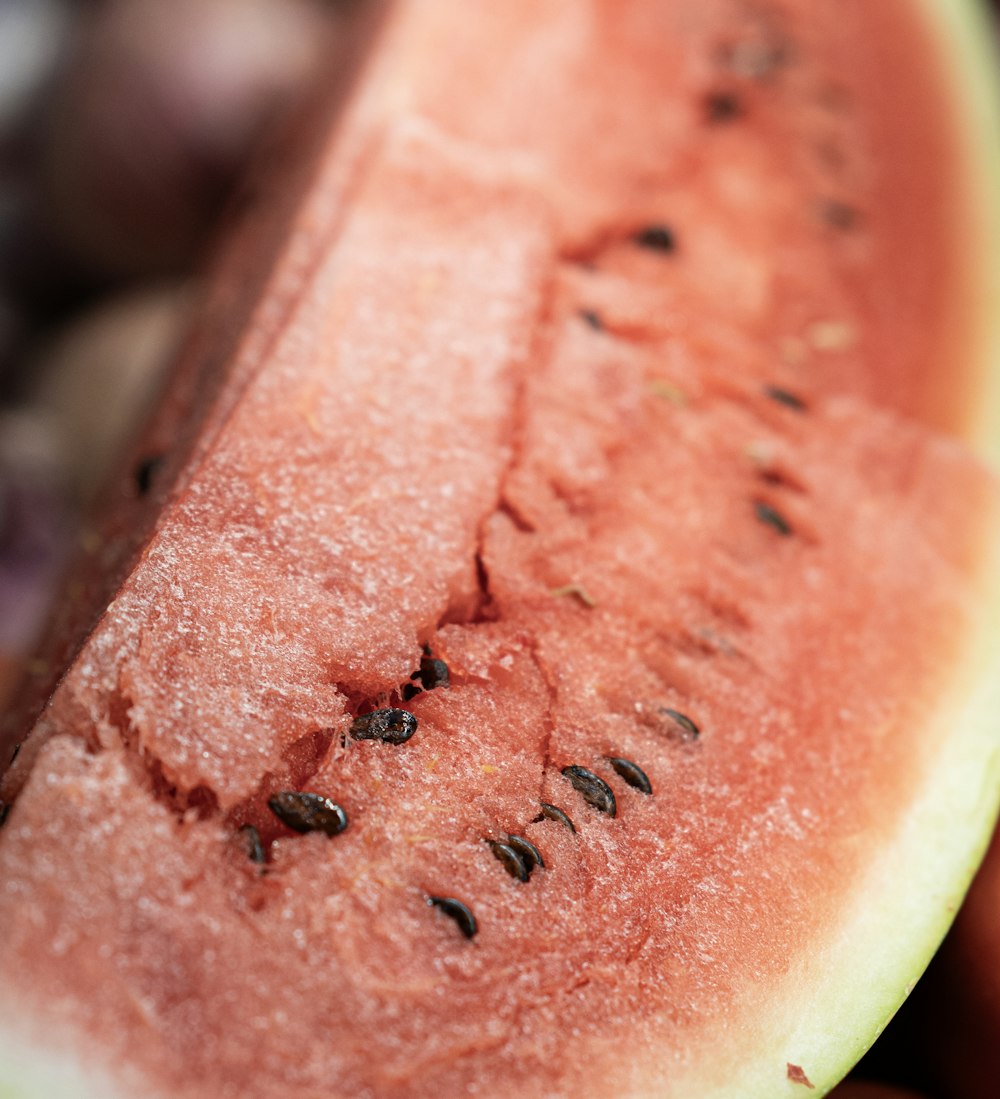 a close up of a piece of watermelon