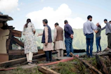 Team members inspecting structural damage and planning next restoration steps.