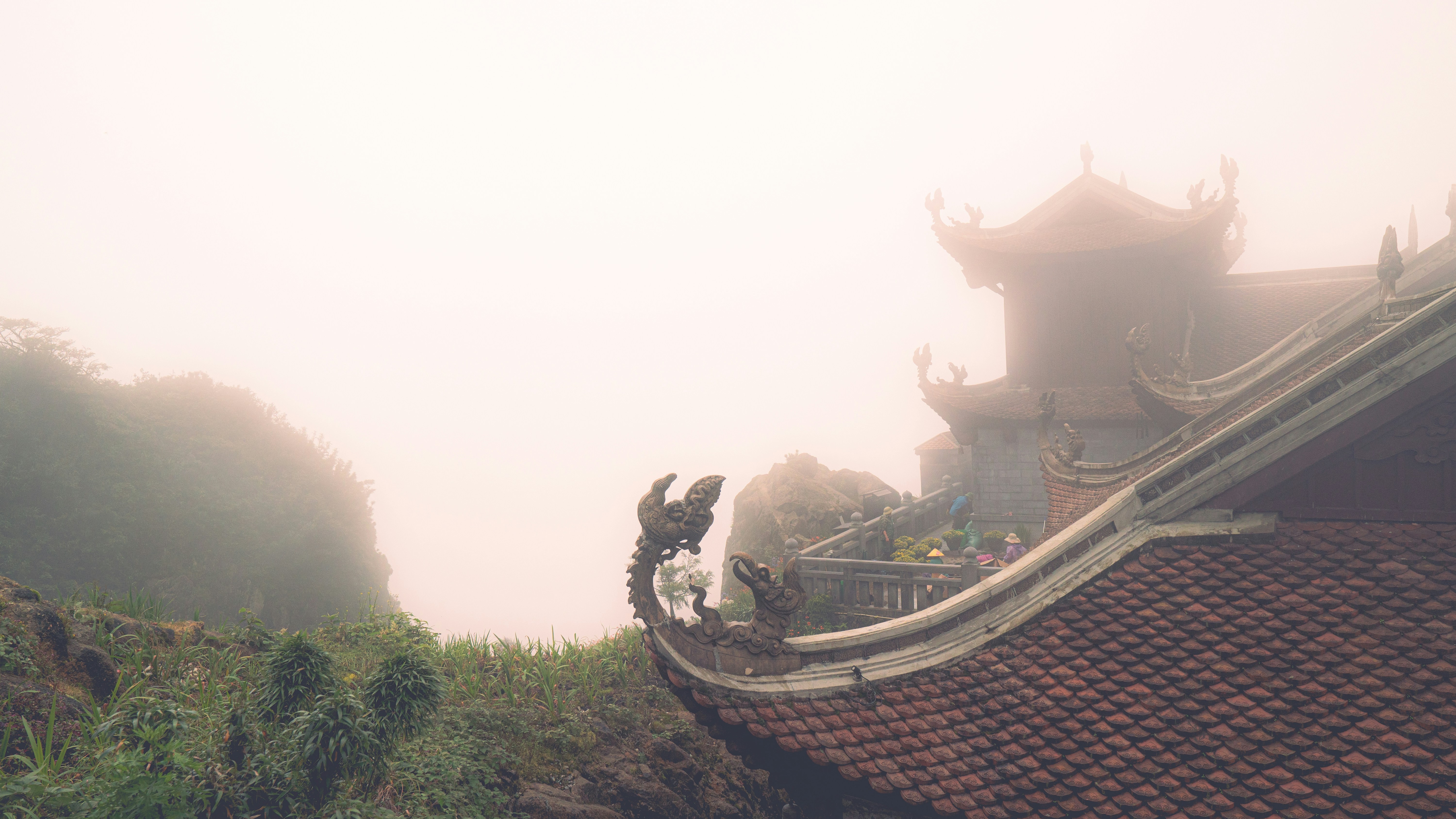 a view of a roof with a statue on top of it