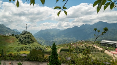 A scenic view of Mizoram's landscape with modern technology elements.