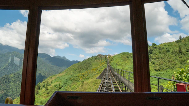 A scenic view through a Unicorn UPVC window framing the majestic Himalayan peaks.