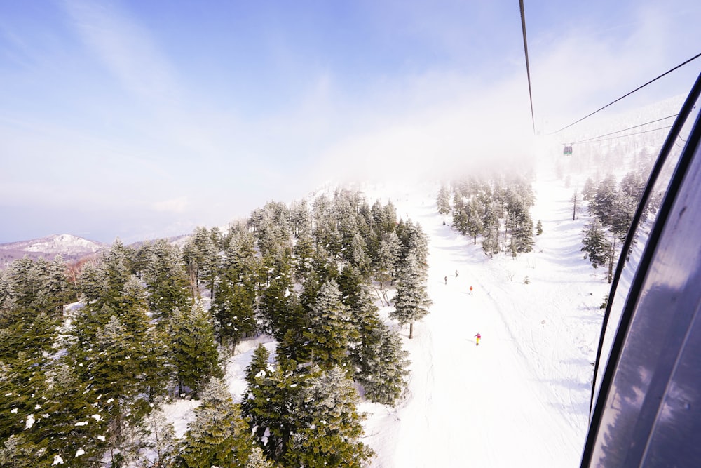 a view of a ski slope from a ski lift