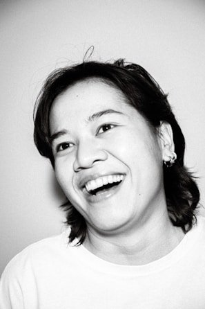 Smiling individual reviewing their personalized brain wellness profile report.