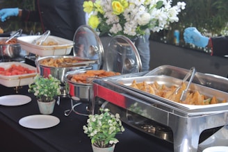 A festive Indian banquet table set up for a catering event