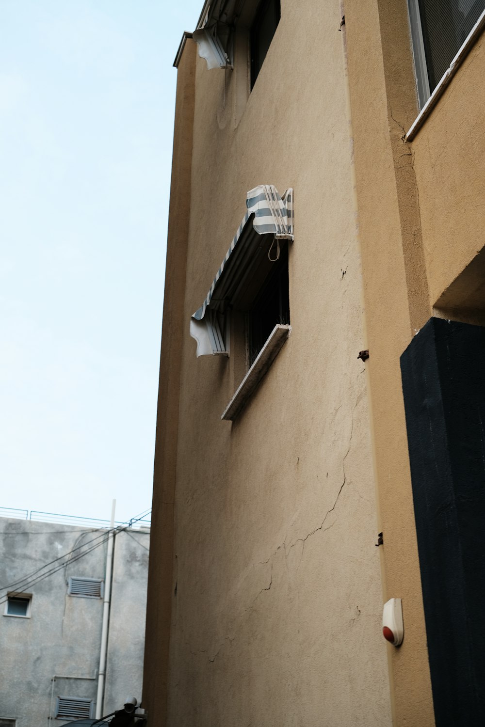 a building with a window and a curtain on it