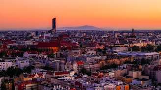 A panoramic view of Córdoba's skyline at sunset.