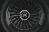 a black and white photo of a jet engine