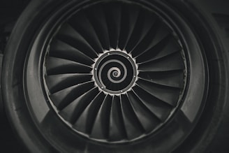 a black and white photo of a jet engine