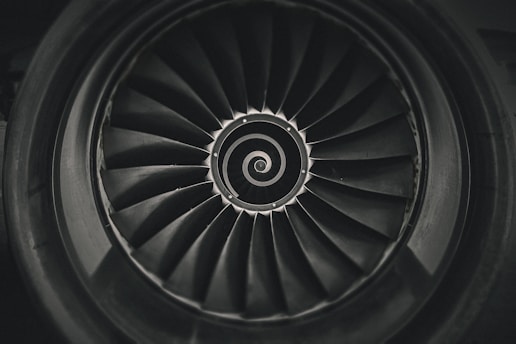 a black and white photo of a jet engine
