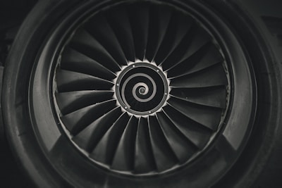 a black and white photo of a jet engine