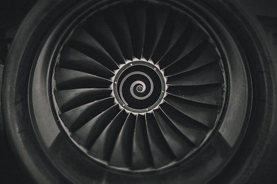 a black and white photo of a jet engine