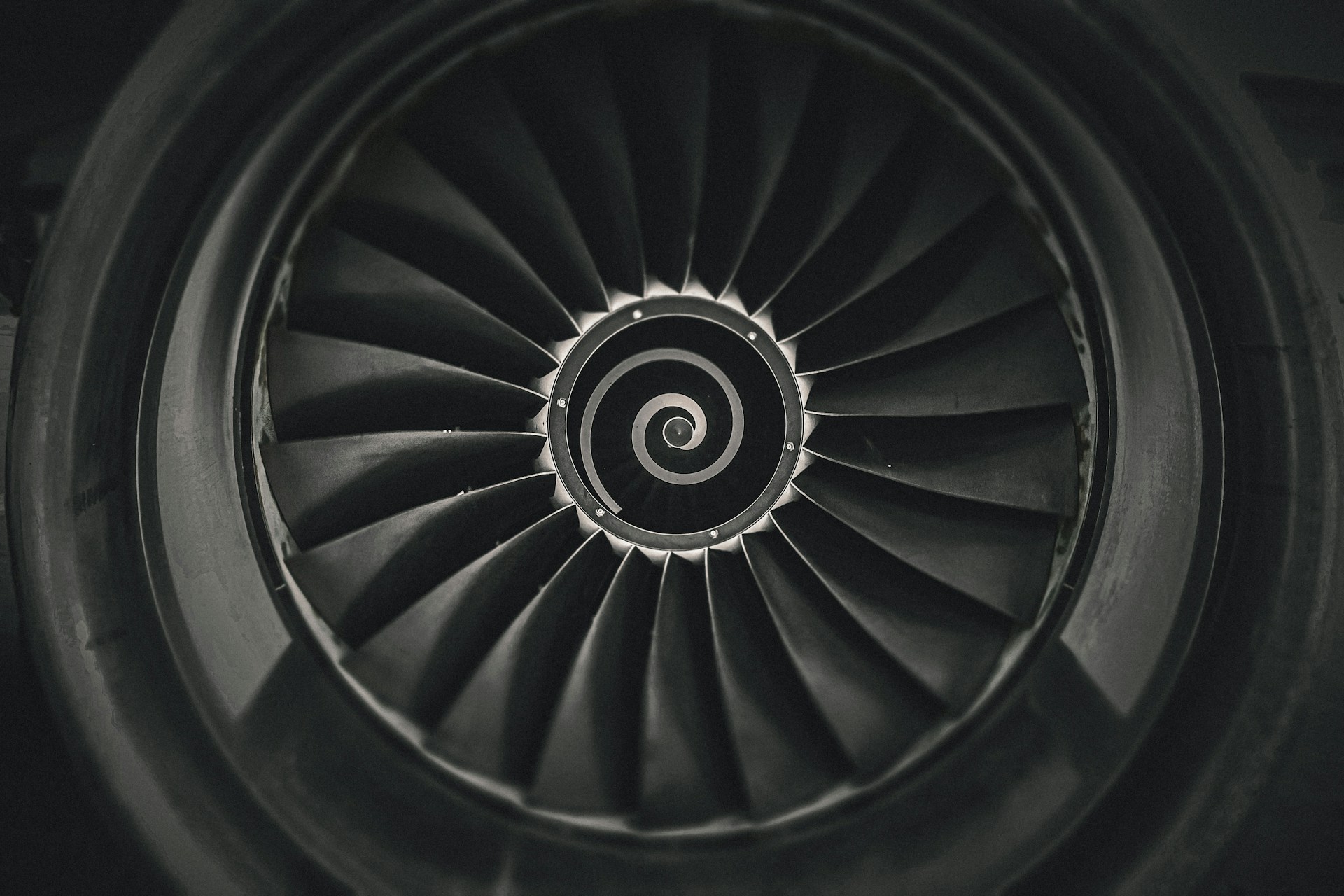 a black and white photo of a jet engine
