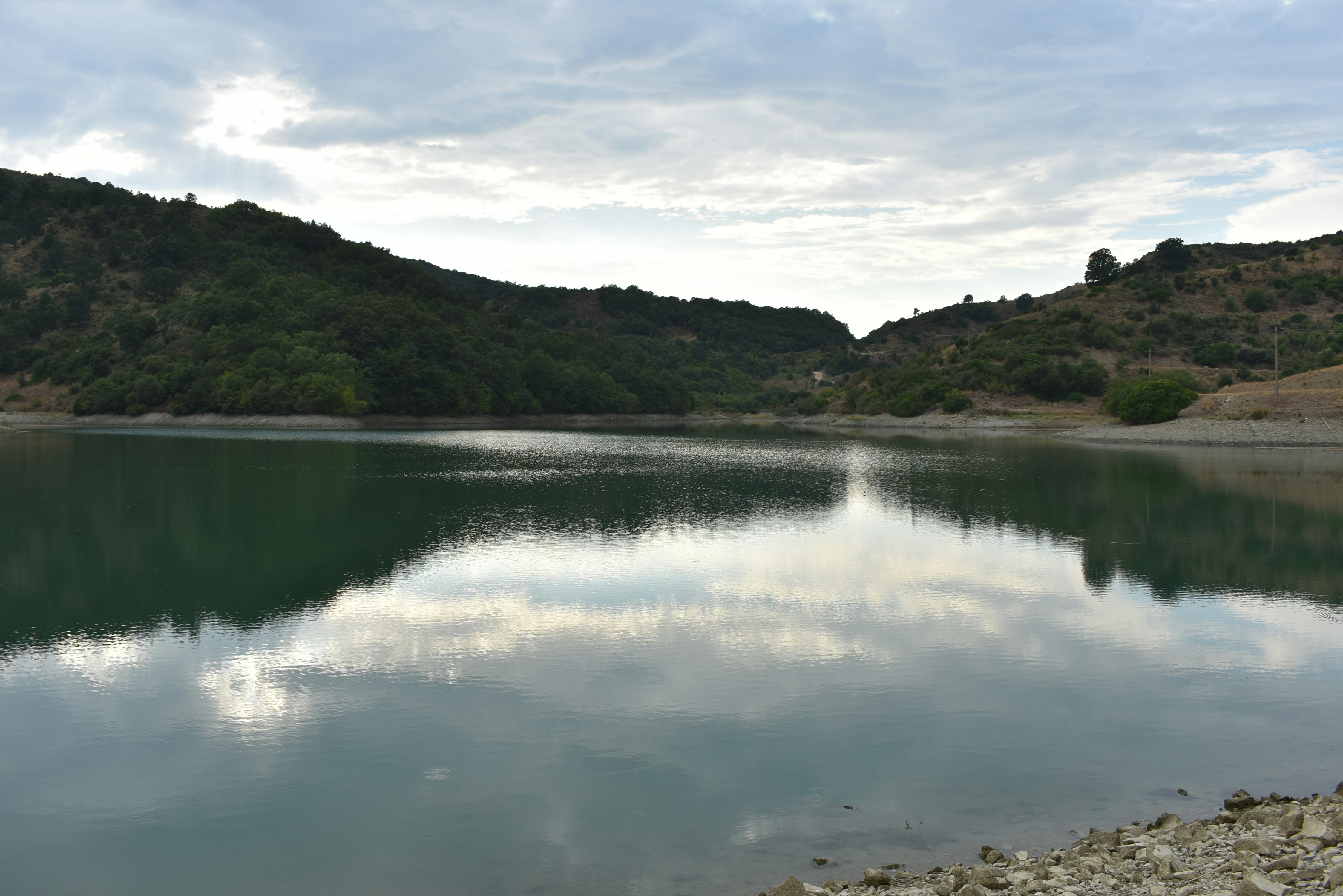 a large body of water surrounded by mountains