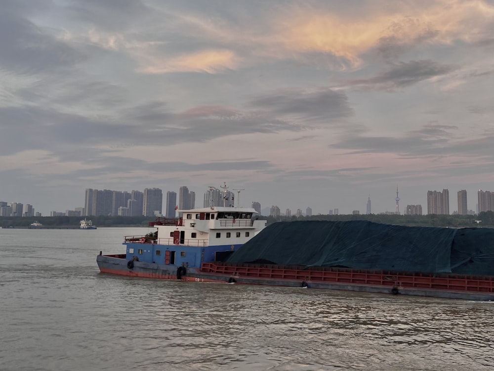 a large boat floating on top of a body of water