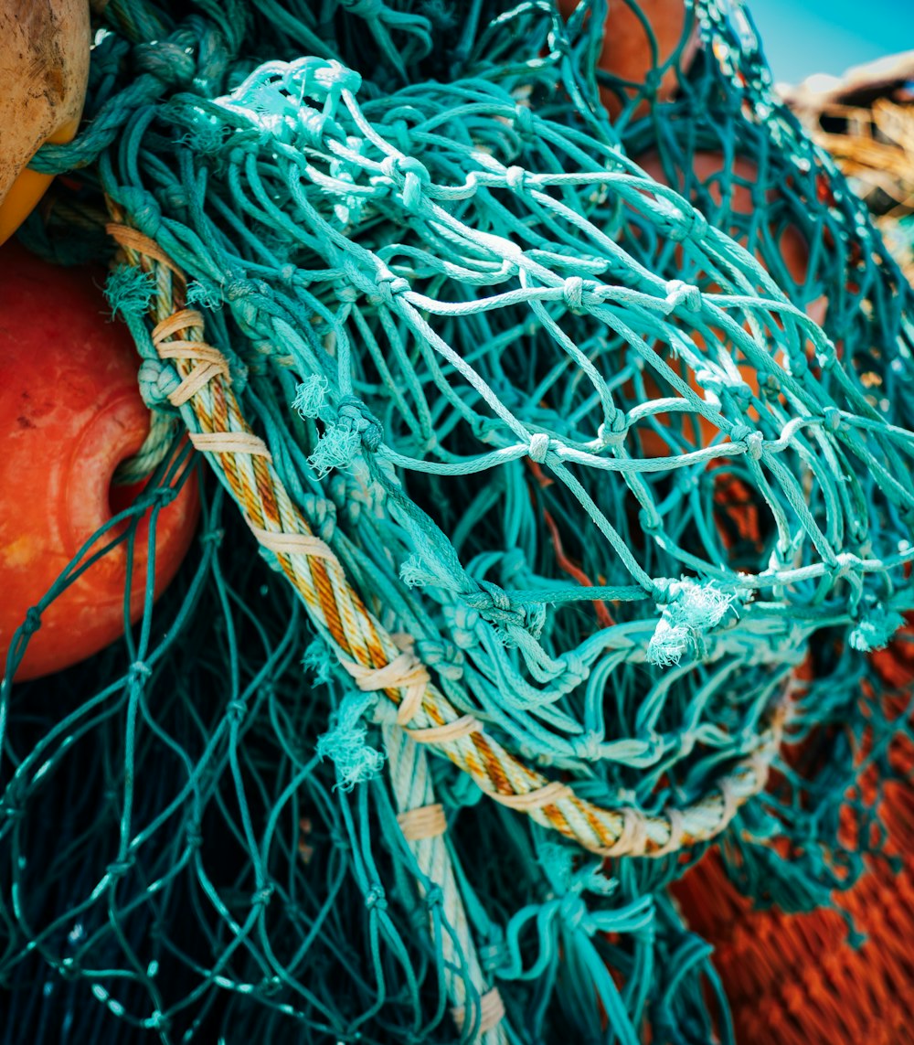a close up of a pile of fishing nets