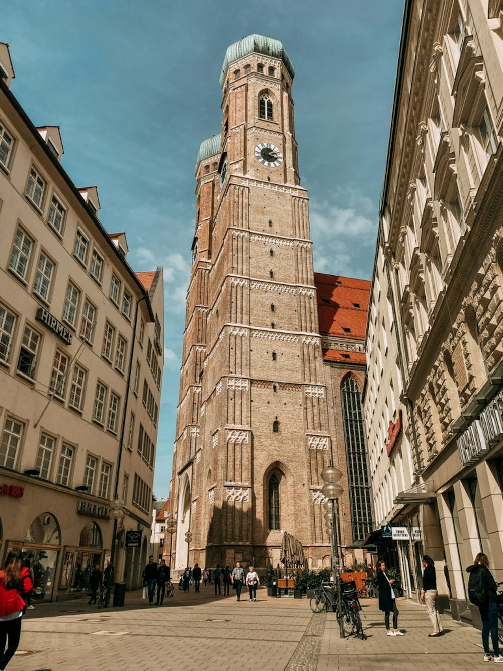 a tall clock tower towering over a city