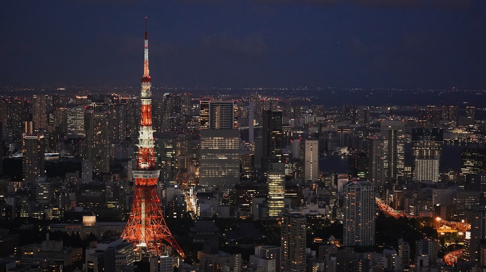 a view of a city at night from the top of a building