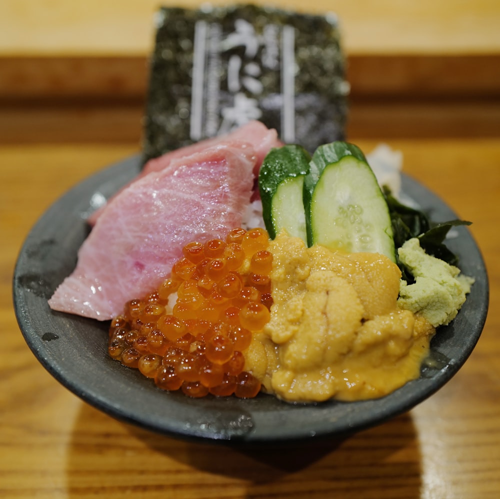 a plate of food on a wooden table