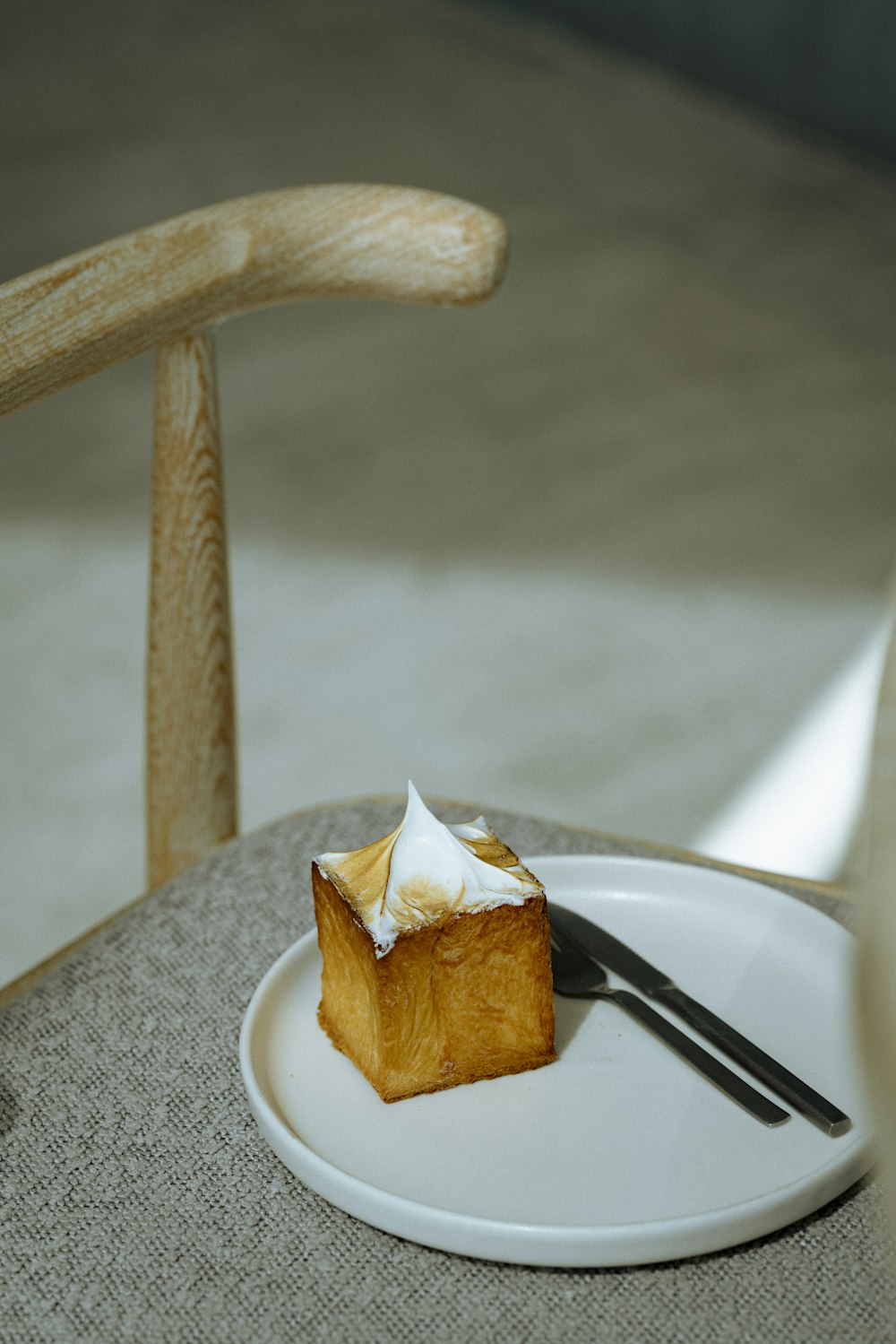 a piece of cake on a plate with a fork