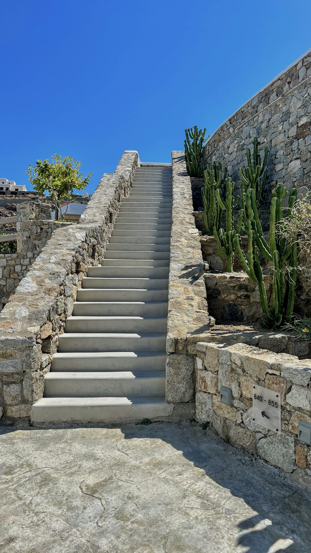 a set of stone steps leading up to a house