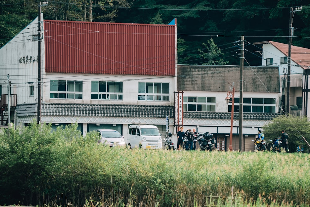 a group of motorcycles parked in front of a building