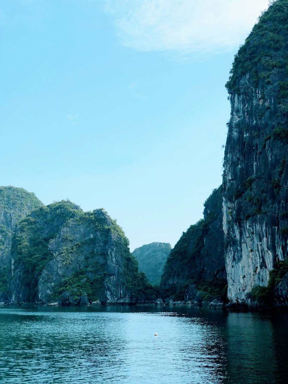 a large body of water surrounded by mountains